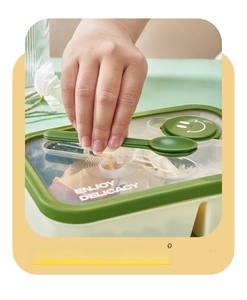 Detail of built-in spoon storage on a bento lunch box lid with eco-friendly design