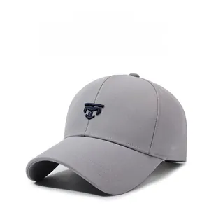 Close-up of embroidered shield logo and side DFSONG printing on dark gray baseball cap