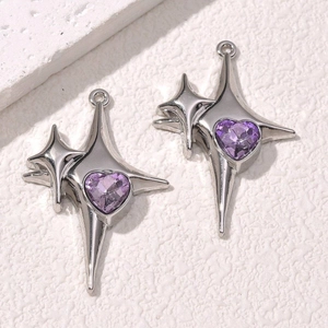 Polished silver alloy star pendants with multifaceted purple heart zircons set in center