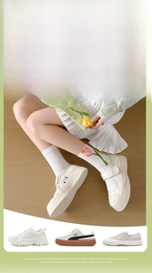 Detailed view of combed cotton socks with tulip embroidery styled with Mary Jane shoes