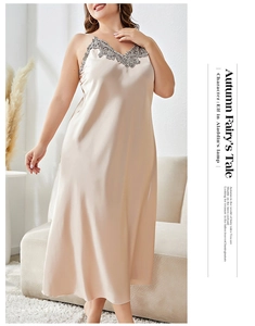 Macro detail of champagne satin slip dress with exquisite grey floral lace at neckline