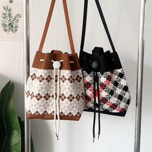 Versatile knitted drawstring bucket bag with geometric patterns and long shoulder straps