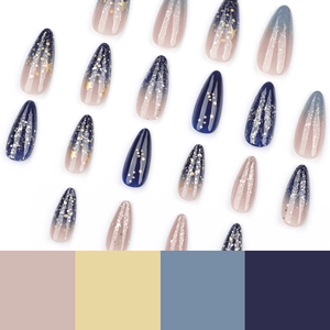 Starry sky press-on nails in blue and pink with golden stars and gradient almond shape
