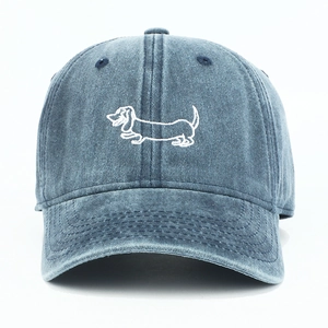 Vintage washed blue denim baseball cap featuring white dachshund dog embroidery for casual wear