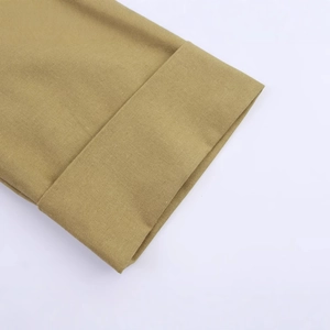 Front view of khaki linen blend double-breasted cropped blazer with twill texture