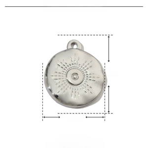 Macro detail of round stainless steel pendant with radial relief texture and dimensions