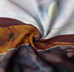 Detail of abstract mountain print tapestry with gold outlines and silk texture finish