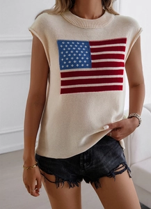 Close-up of beige sleeveless knit top with American flag pattern and texture details