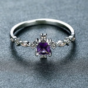 Elegant silver ring with square purple gemstone and hollow diamond-encrusted sides