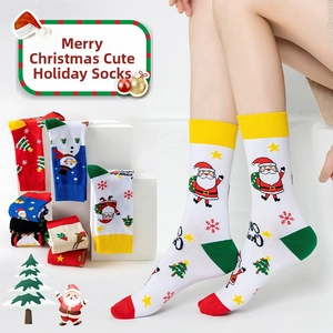Detailed view of assorted Christmas cotton socks with Santa and reindeer patterns