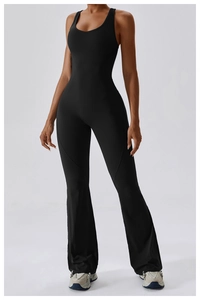 Detailed back view of sleek black slim-fit flared yoga jumpsuit in quick-dry fabric