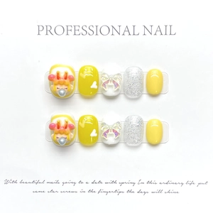 Detailed view of handmade press-on nails featuring 3D anime characters and silver glitter