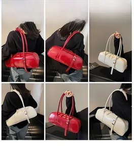 Detail shots of minimalist baguette bag in red and beige with adjustable shoulder strap