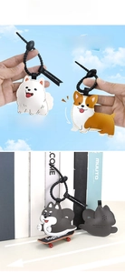 Close-up of cute cartoon dog leather keychain with squeaky sound and skateboard detail