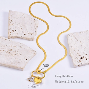 Detail of 46cm gold snake chain with detachable heart and petal charms and swivel clasp