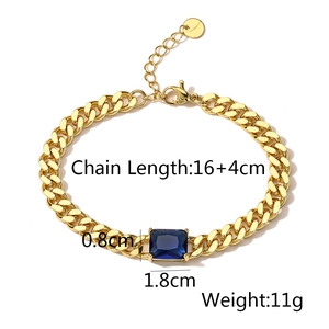 Detail of 18K gold-plated Cuban link bracelet with rectangle blue zircon gemstone