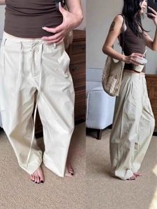 Vintage American style high-waisted off-white wide leg pants with cotton linen texture