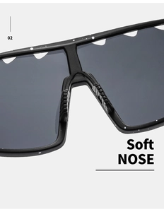 Macro detail of soft anti-slip nose pad on black speckled sports cycling sunglasses