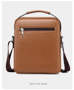 Rear view of brown lychee texture PU leather shoulder bag with zipper pocket and handle