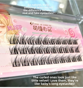 Detail of natural segmented faux mink eyelashes in individual clusters with soft fibers