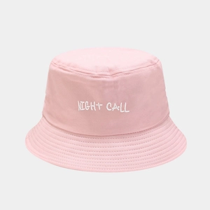 Detail of pink cotton bucket hat with white Night Call embroidery and stitched brim