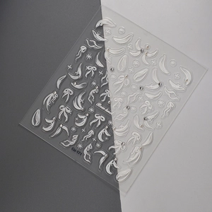 3D embossed nail stickers featuring white bow-knots, stars, pearls, and rhinestones