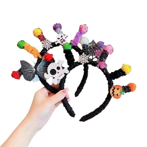 Halloween glowing headbands with plush bats, spiders and pumpkins on white background