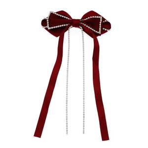Large red velvet bow hair clip with sparkling rhinestone edges and tassel chains