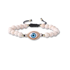 Detail of turquoise beaded evil eye bracelet with adjustable braided drawstring cord