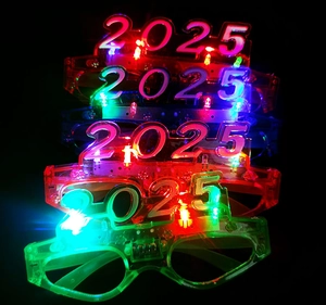 Macro view of 2025 glowing LED party glasses showing multiple neon colors on black background