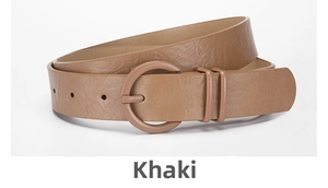 Detail of khaki PU leather belt showing fine texture and a round matching buckle