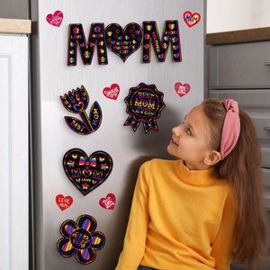Rainbow scratch art Mother's Day fridge magnets shown on metal door in home setting