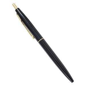 Stylo à bille rétractable noir classique avec finitions dorées sur fond blanc neutre