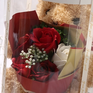 Romantic soap flower bouquet and teddy bear in a premium gift box for special occasions