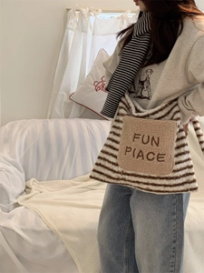 Winter striped faux fur tote bag with plush front pocket and embroidery for women