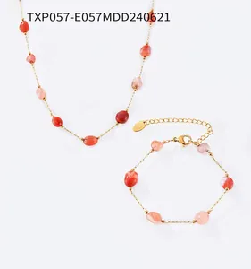 Detailed shot of titanium steel jewelry set with natural agate beads and S.Steel tag