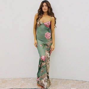 Detail of French vintage style green floral maxi dress with elegant pattern prints
