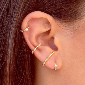 Elegant 18k gold plated geometric ear cuff set with micro-set zircon on model