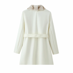Back view of a white wool coat featuring a faux fur collar and matching waist belt