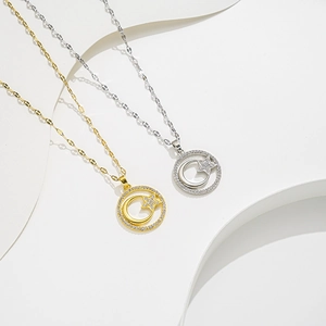 Minimalist gold and silver star and moon pendant necklaces with sparkling crystals