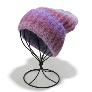 Fuzzy tie-dye knit beanie in purple and magenta mix with thick fold-over cuff
