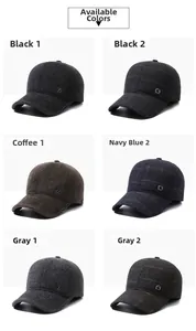 Detail view of winter woolen baseball caps showing thick textures and metal emblems