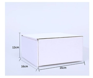 Corrugated white ceramic gift box dimensions showing 16x16x12cm for holiday ornaments