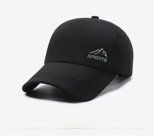 Detail view of black breathable sports cap with mountain logo and mesh ventilation holes