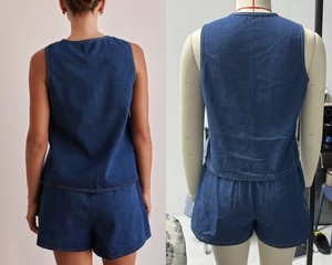 Detail view of deep blue denim two-piece set featuring sleeveless vest and high waist shorts