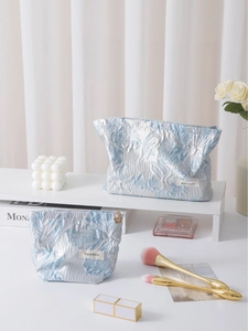 Blue lily jacquard embossed makeup bag set with floral texture and metal zipper