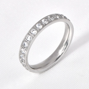 Detailed 45-degree angle view of silver stackable eternity ring with cubic zirconia stones
