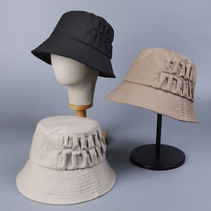 Linen sun hats for women showing pleated texture in black, khaki, and beige colors