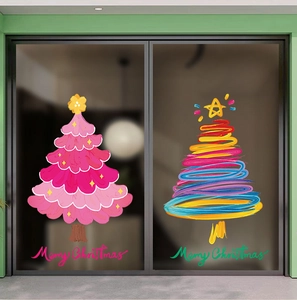 Detail of colorful static Christmas tree window stickers with Merry Christmas text