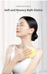 Detailed honeycomb texture of the cheese bath ball creating rich foam during usage